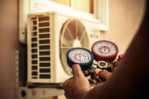 Professional Hvac technician working in Youngsville, LA